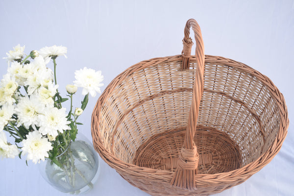 Large wicker basket with handle